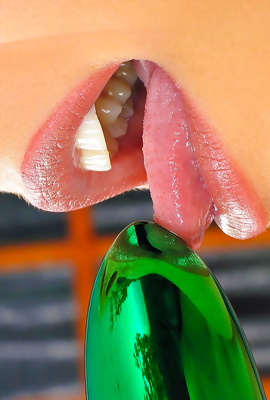 Sweet Liz Honey trys her new green dildo