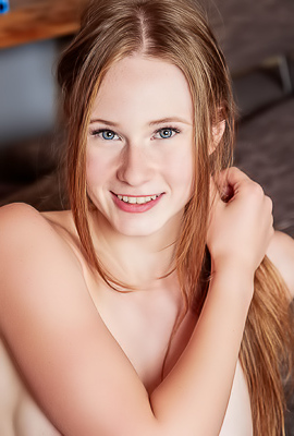 Zuzanna Shows Off Her Pretty Blue Eyes And Natural Curls In Lingerie